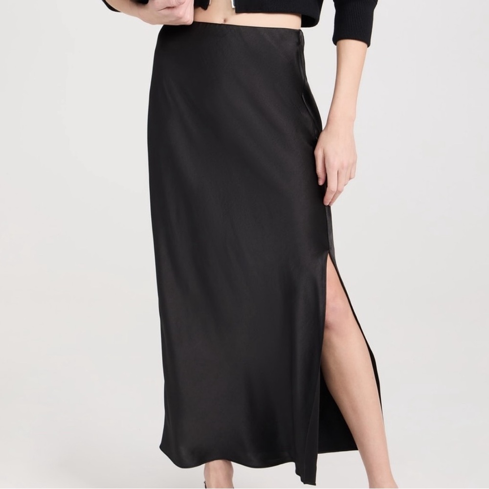 Frame long maxi skirt with luxurious draping and dramatic column silhouette.